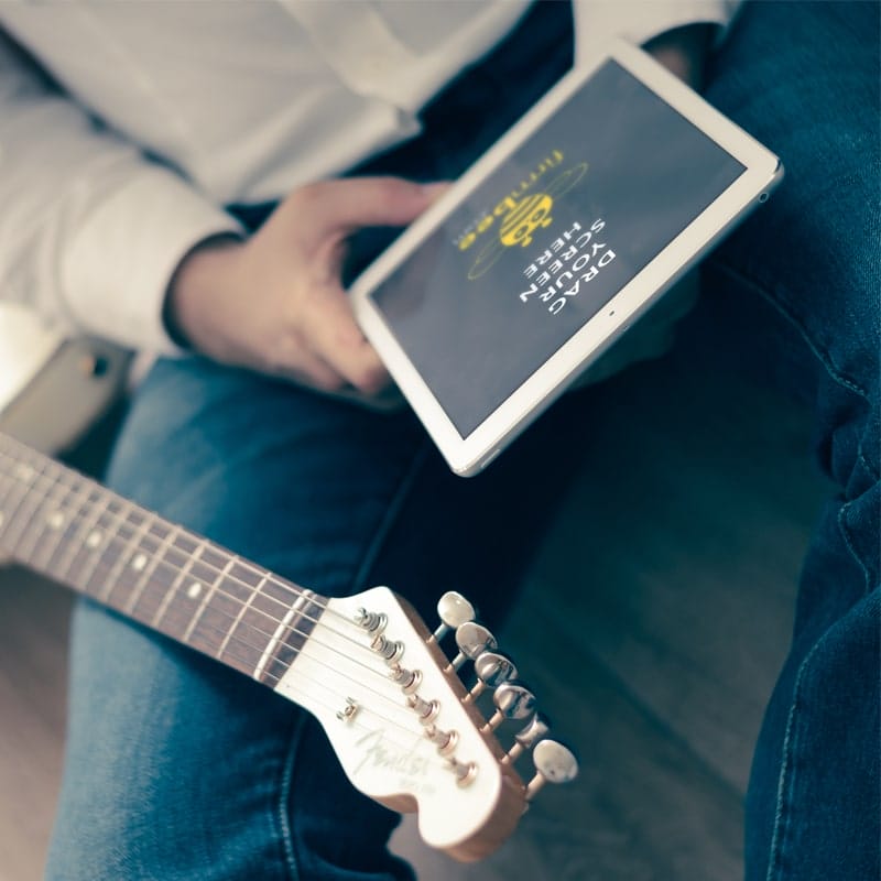 Man With An iPad Free Mockup PSD