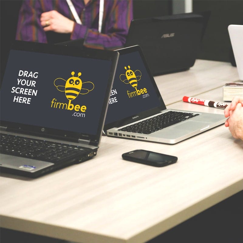 Startupers At The Desk Free PSD With MacBook Pro