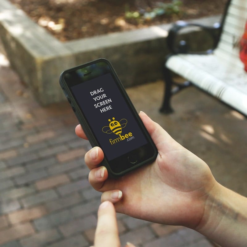 iPhone at Park HD Mockup PSD