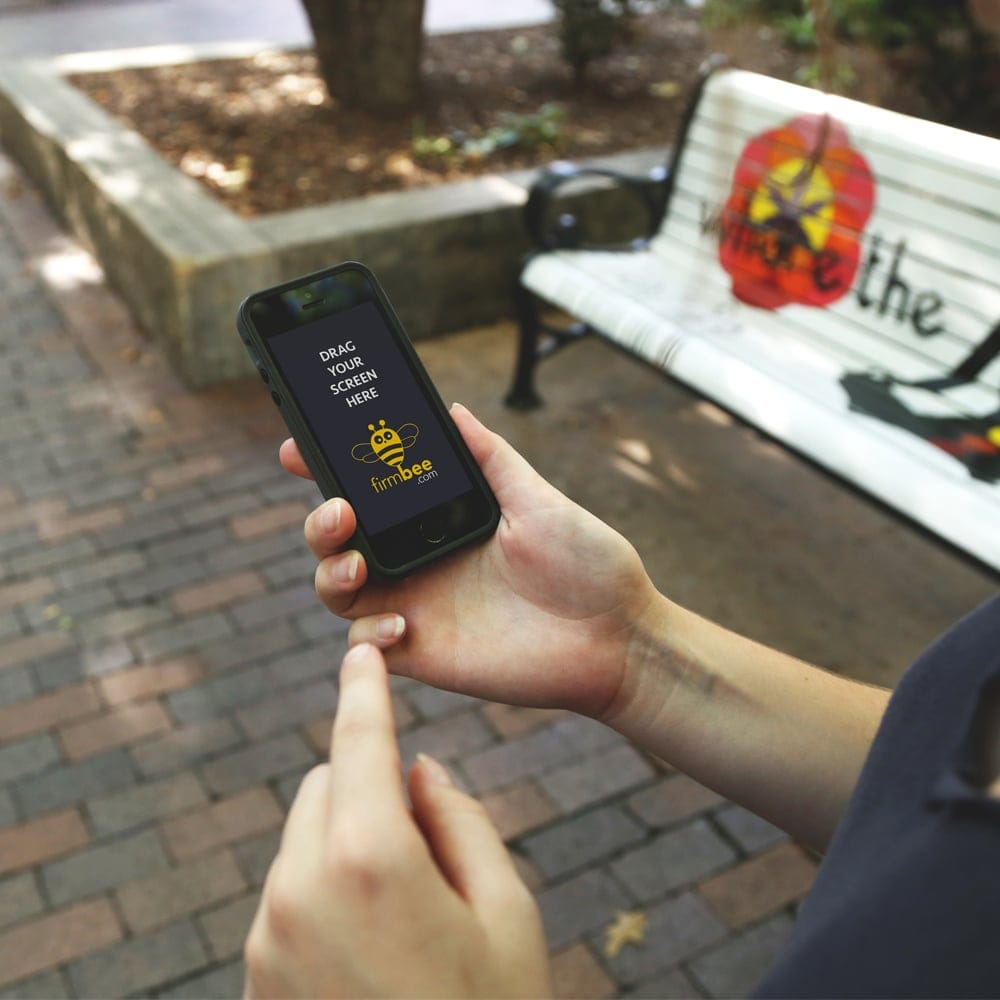 iPhone at Park HD Mockup PSD