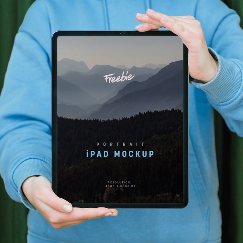 Free Hand Holding iPad Pro Mockup PSD