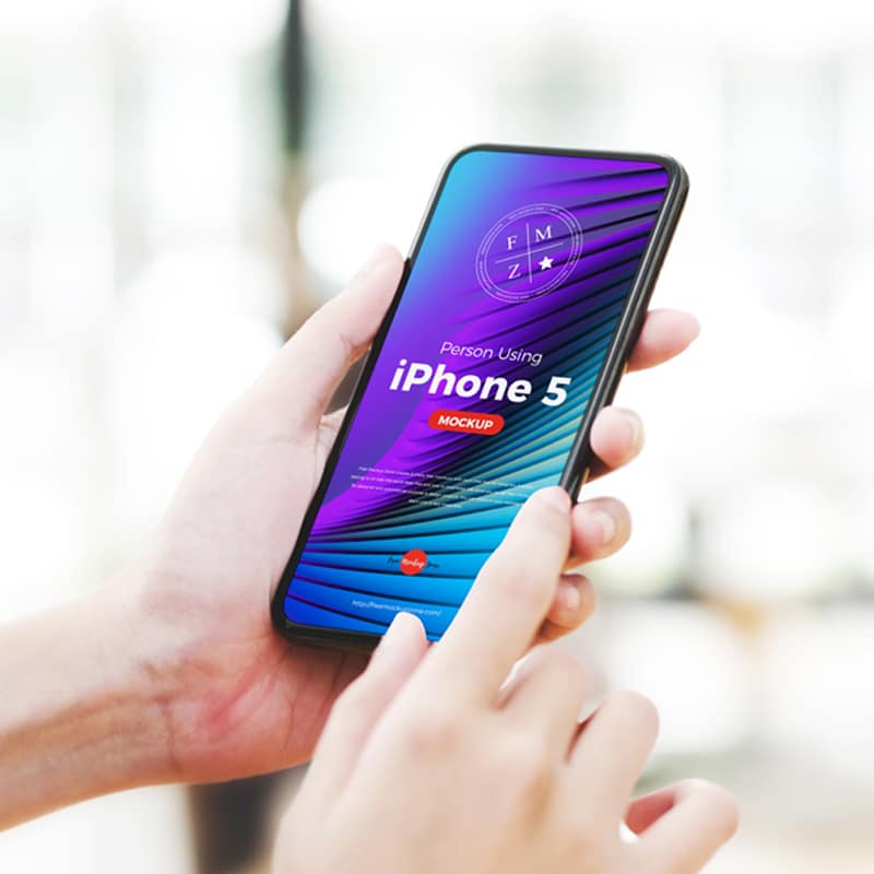 Free Person Using iPhone 5 Mockup