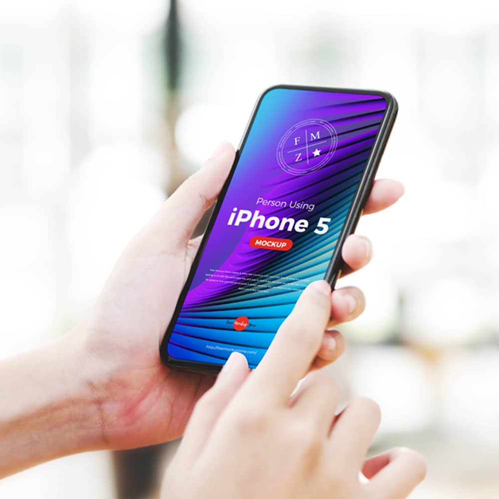 Free Person Using iPhone 5 Mockup