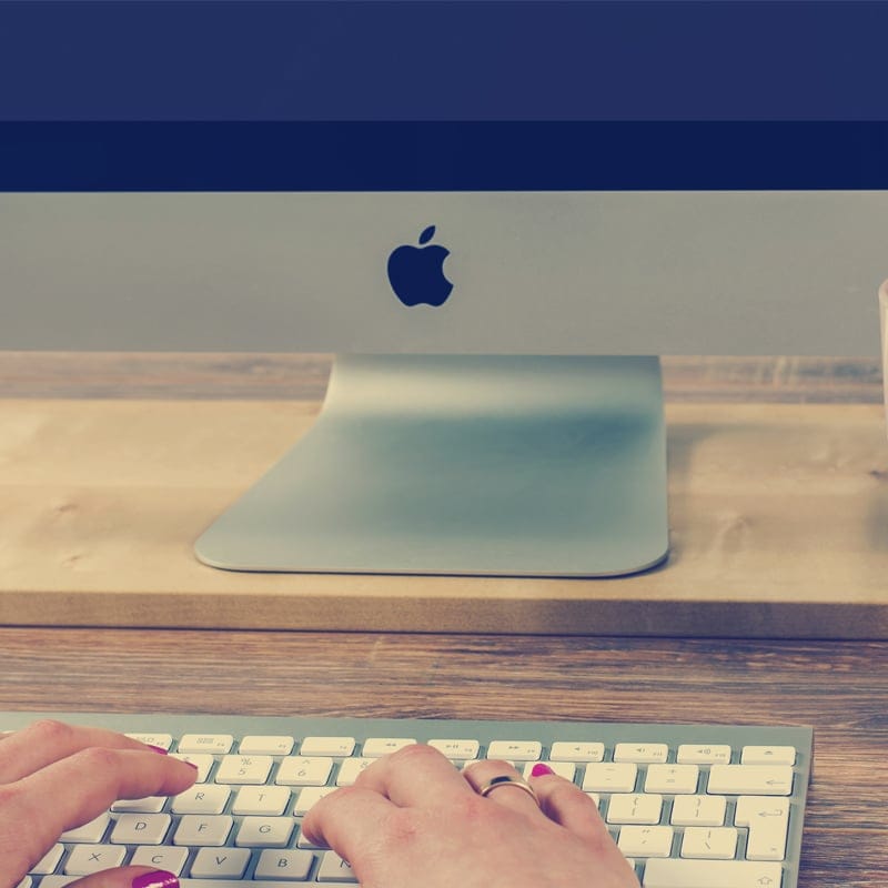 Freelance Working On Apple MacBook Free Mockup PSD