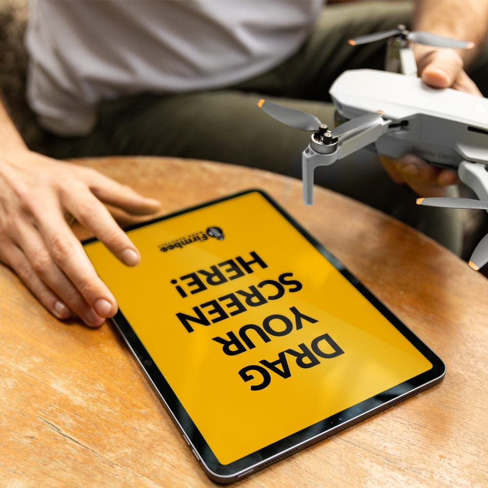 Man With Mavic Drone And Apple iPad Free Mockup PSD