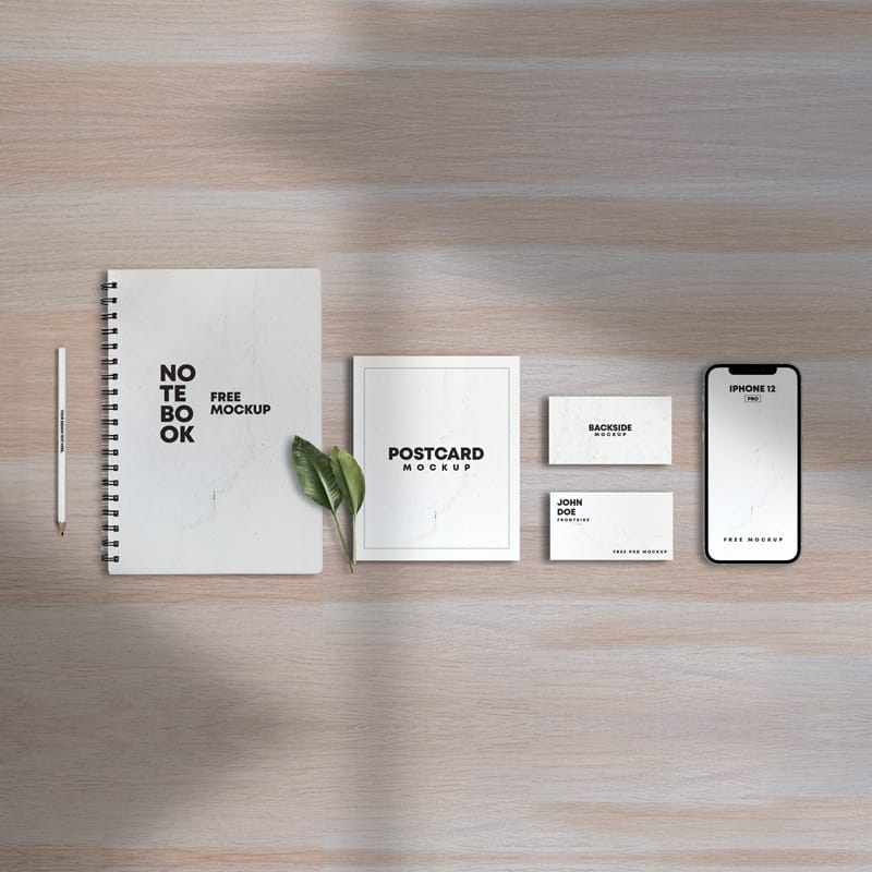 Notebook With Papers & iPhone 12 Free Mockup