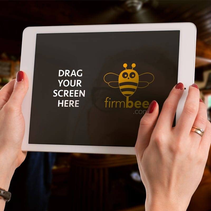 Woman Using iPad In The Pub Free Mockup PSD