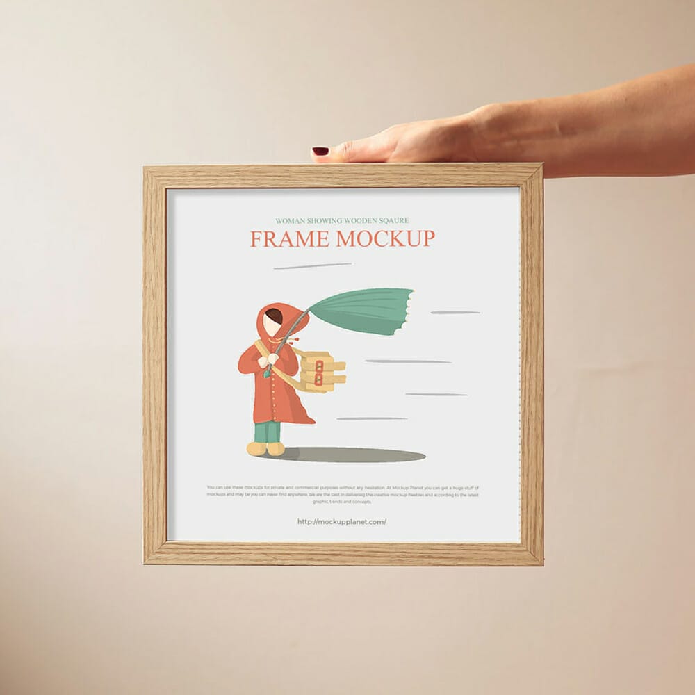 Free Woman Showing Wooden Square Frame Mockup Design
