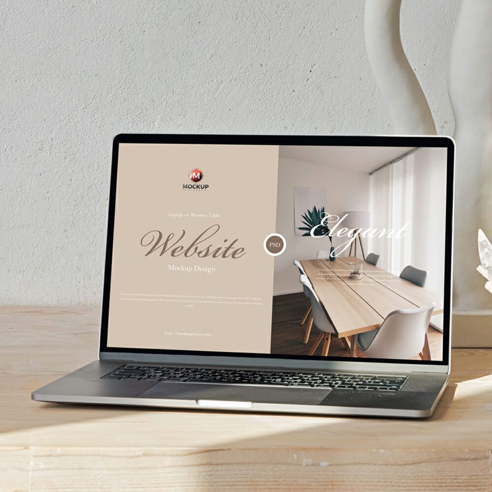 Free Laptop on Wooden Table Website Mockup Design