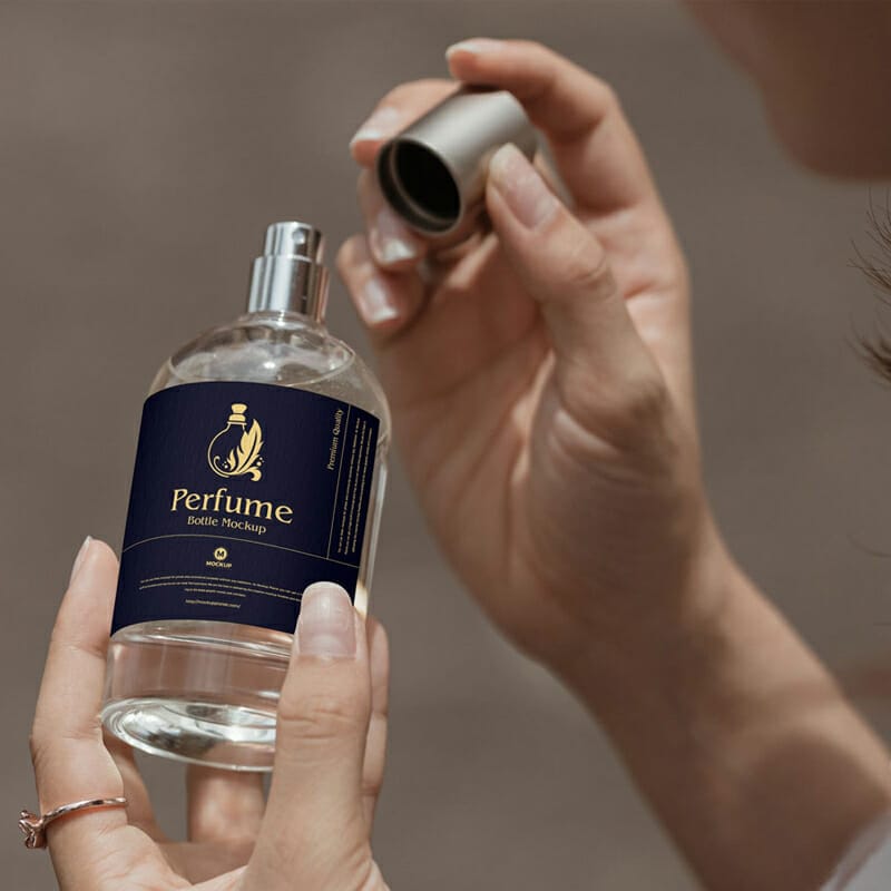 Free Woman Opening Perfume Bottle Mockup Design