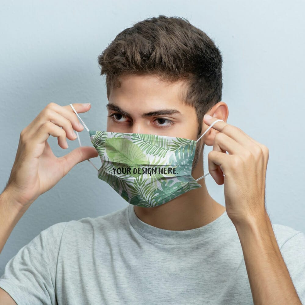 Guy Putting on a Face Mask Mockup