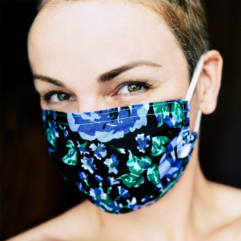 Smiling Woman in Face Mask