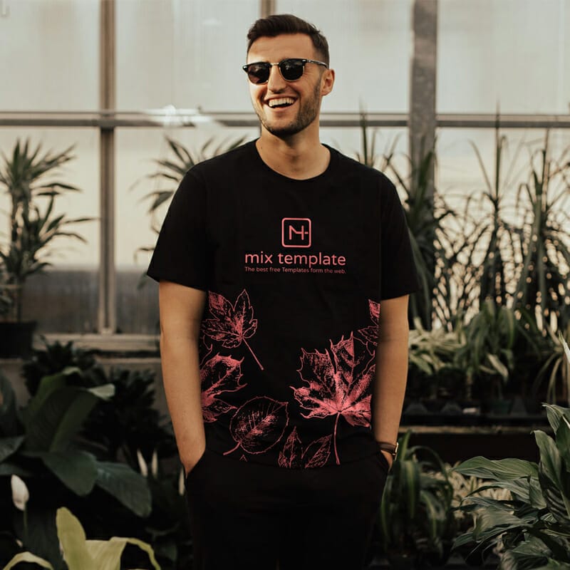 Free Smiling Man In Black T-Shirt Mockup Template