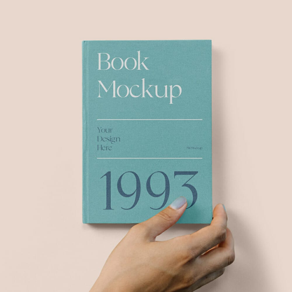 Hard Cover Book With Hand Mockup