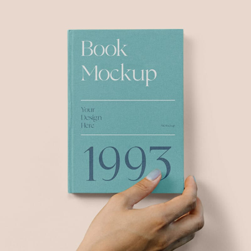 Hard Cover Book With Hand Mockup