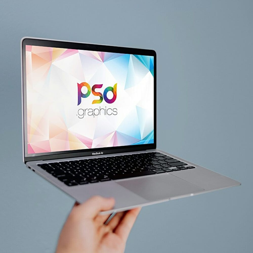 Holding Macbook Air Mockup