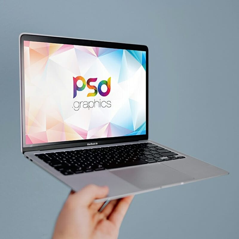 Holding Macbook Air Mockup