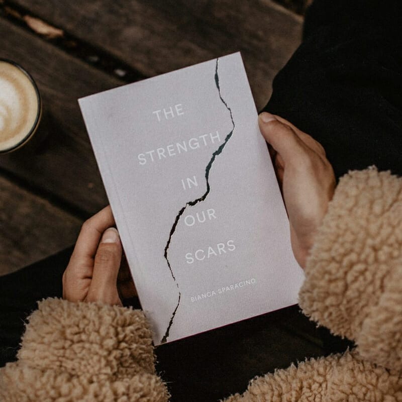 Book In Hands Mockup