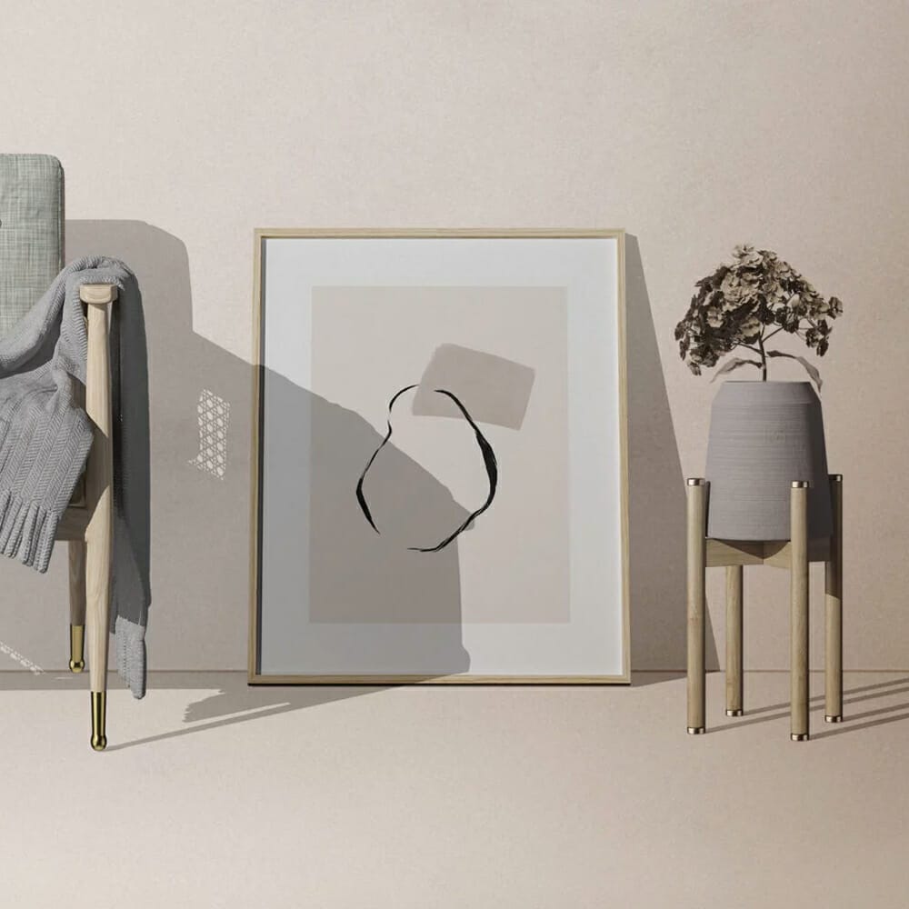 Free Frame Mockups On The Floor With Decorative Vase And Chair