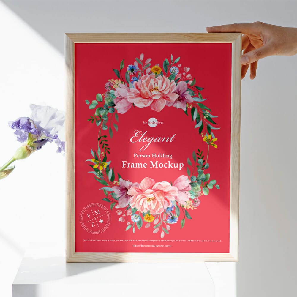 Free Elegant Person Holding Frame Mockup