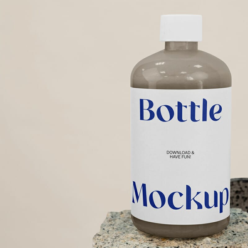 Bottle On Stone Mockup
