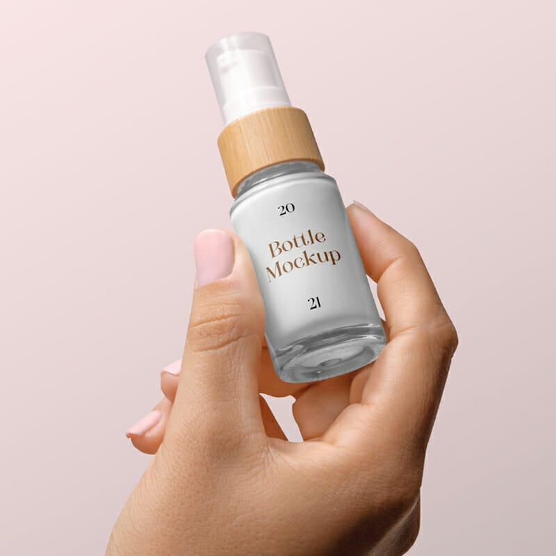 Bottle With Woman Hand Mockup