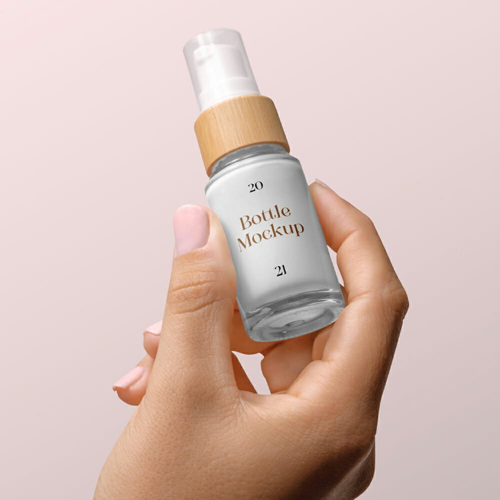 Bottle With Woman Hand Mockup