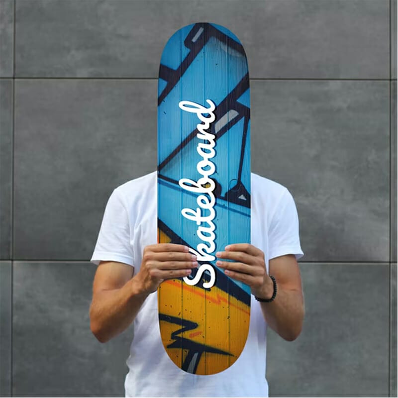 Man Holding Skateboard PSD Mockup