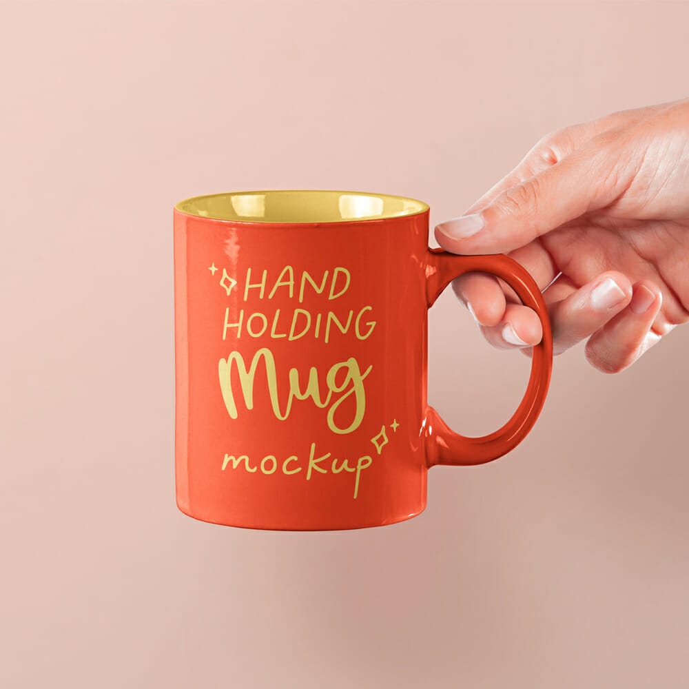 Hand Holding PSD Mug Mockup