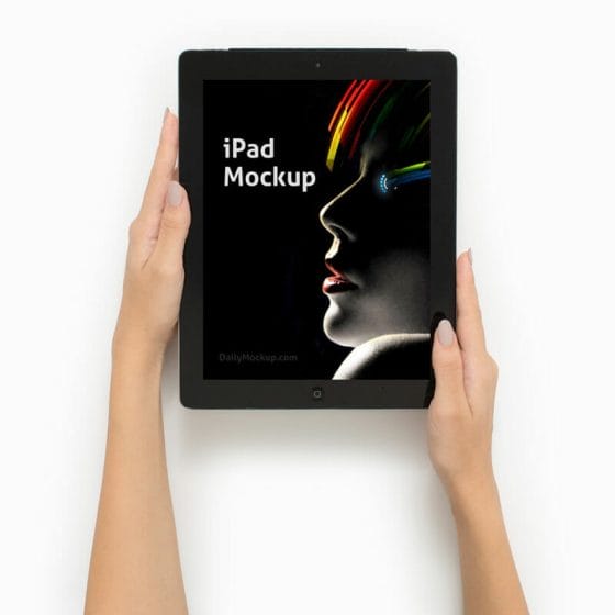Free iPad Mockup Holding In Hand
