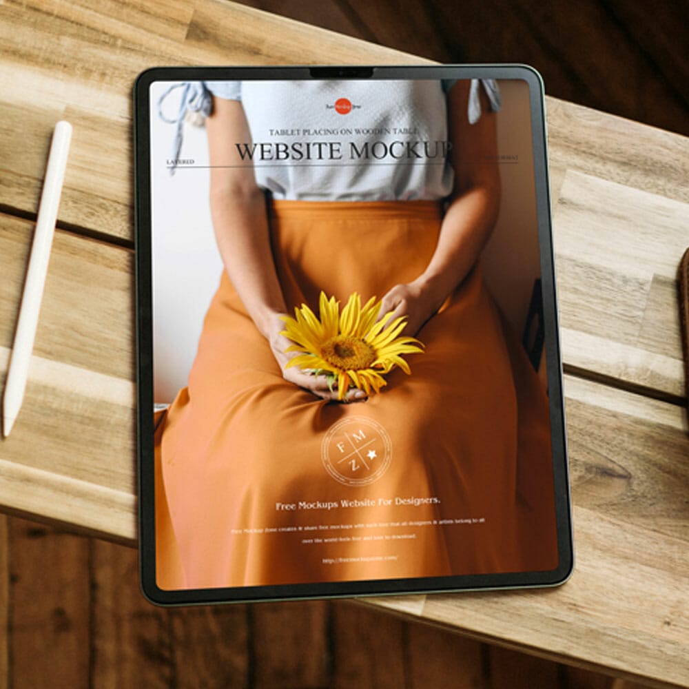 Free Tablet Placing On Wooden Table Website Mockup