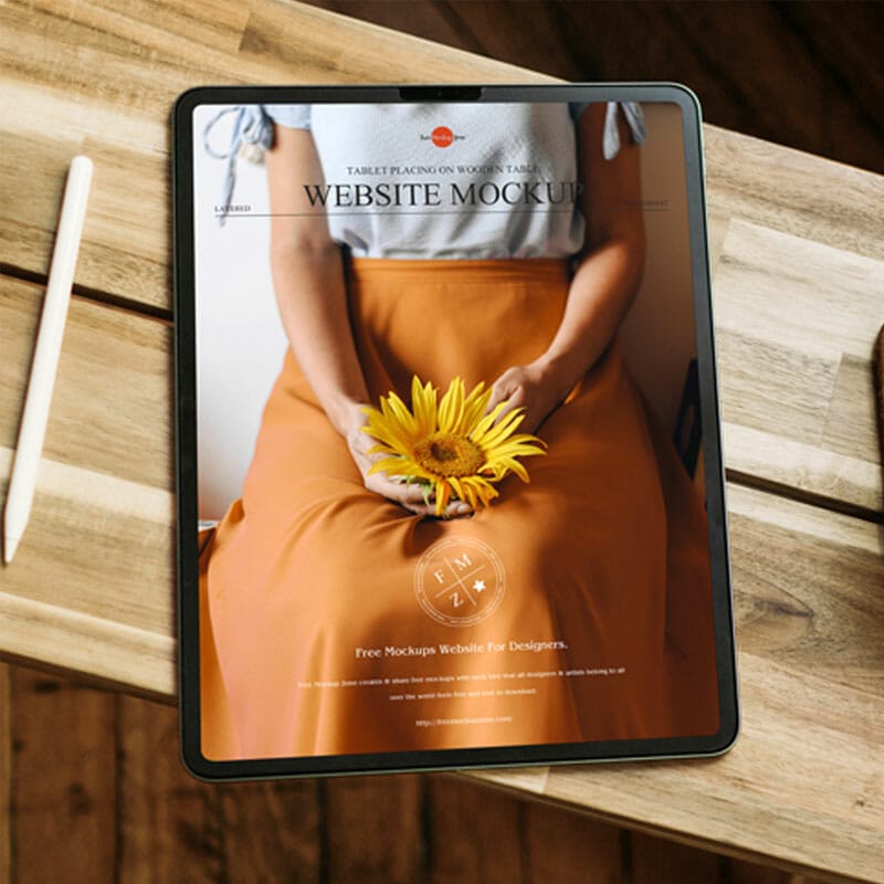Free Tablet Placing On Wooden Table Website Mockup