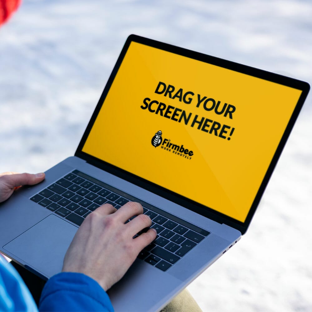 Man Uses Apple MacBook Pro In A Park During Winter Free Mockup