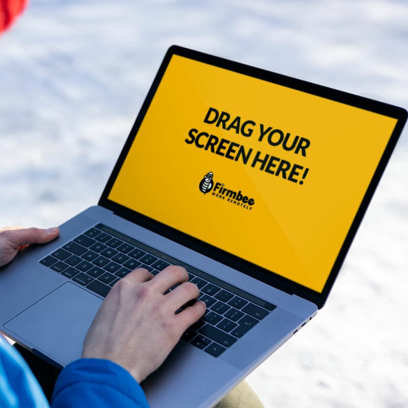 Man Uses Apple MacBook Pro In A Park During Winter Free Mockup