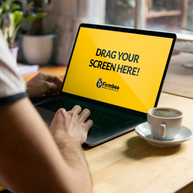 Man Works On Apple MacBook Pro In A Cafe Free Mockup