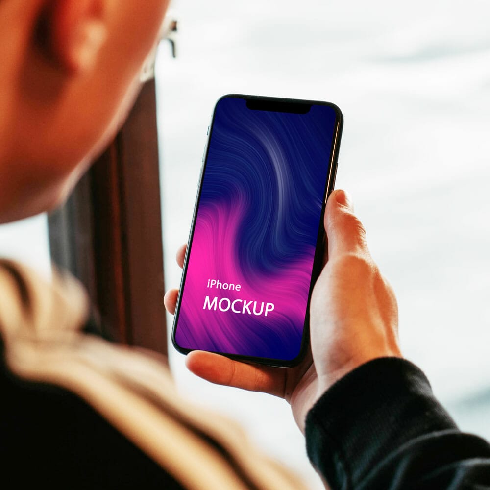 Holding An iPhone Mockup
