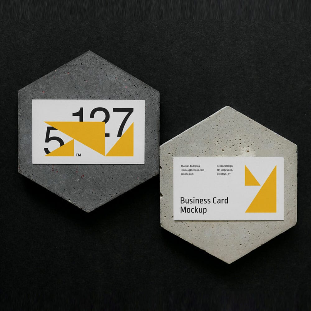 Two Business Cards On A Concrete Mockup