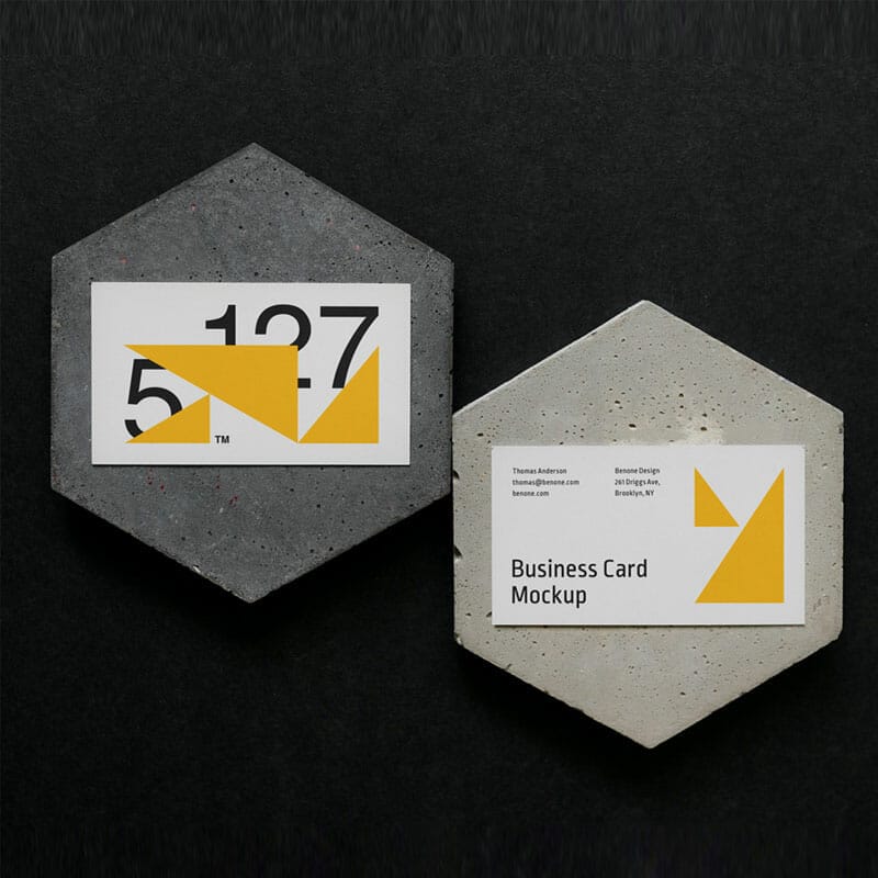 Two Business Cards On A Concrete Mockup