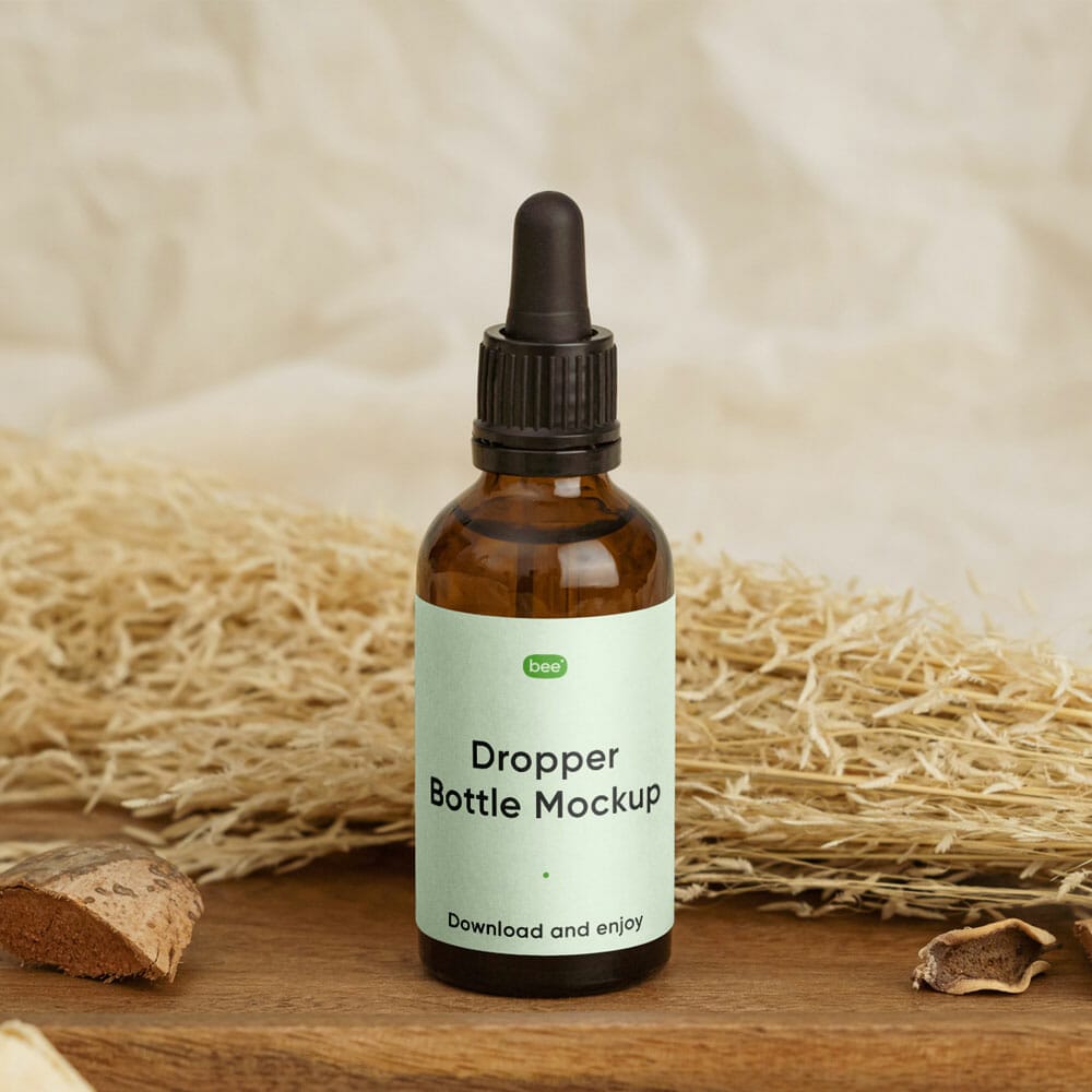 Free Dropper Bottle With Plant Mockup