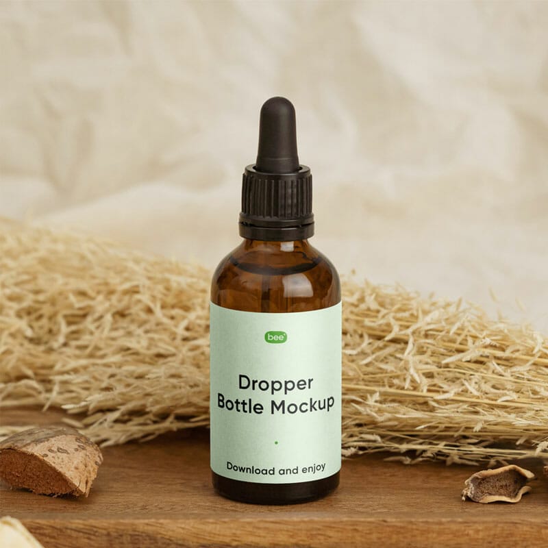 Free Dropper Bottle With Plant Mockup