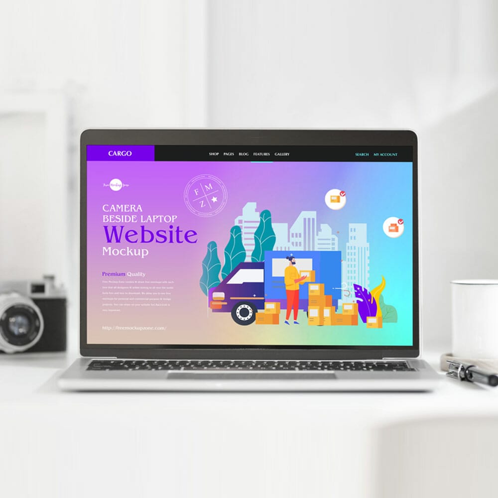 Free Camera Beside Laptop Website Mockup