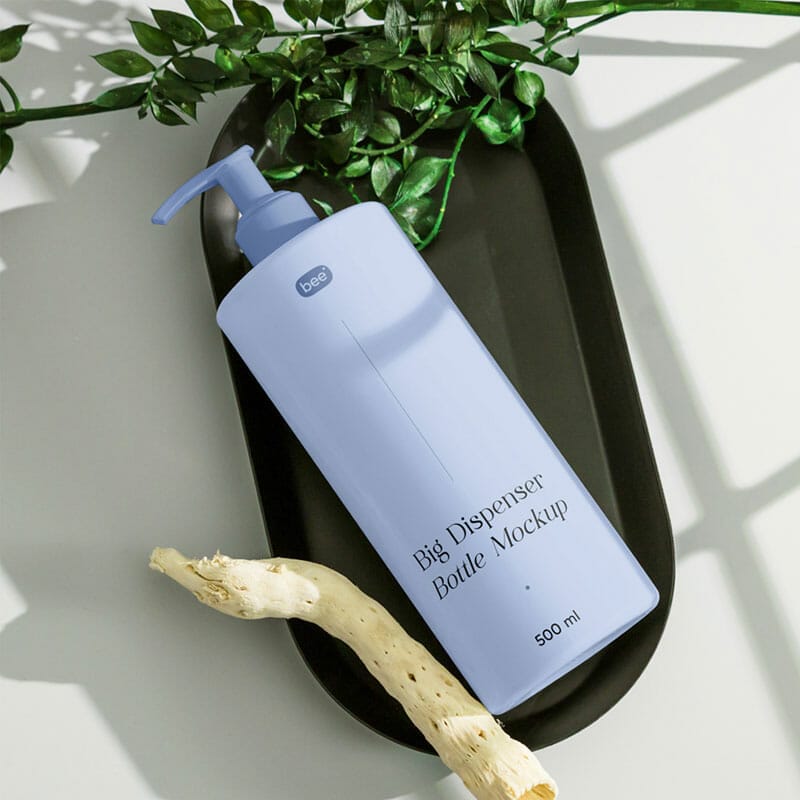Free Dispenser Bottle With Plant Mockup