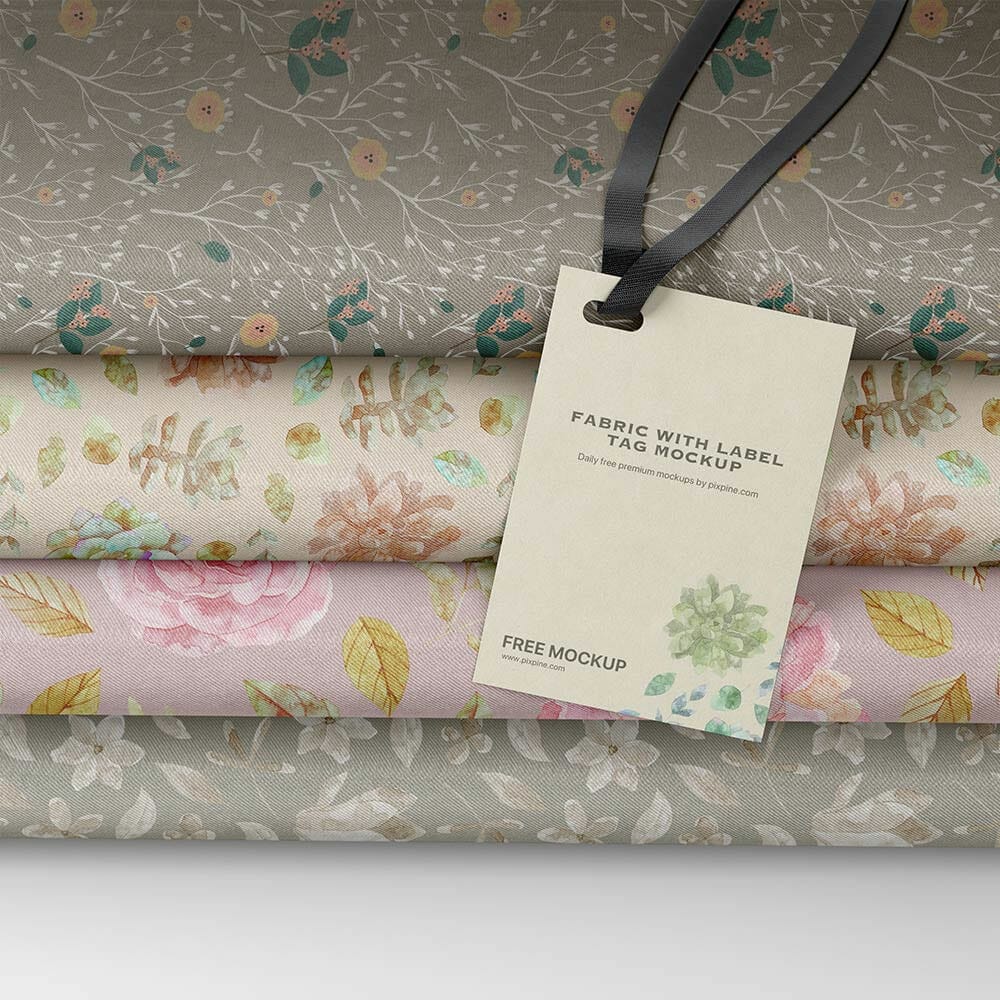 Free Folded Fabric With Label Tag Mockup