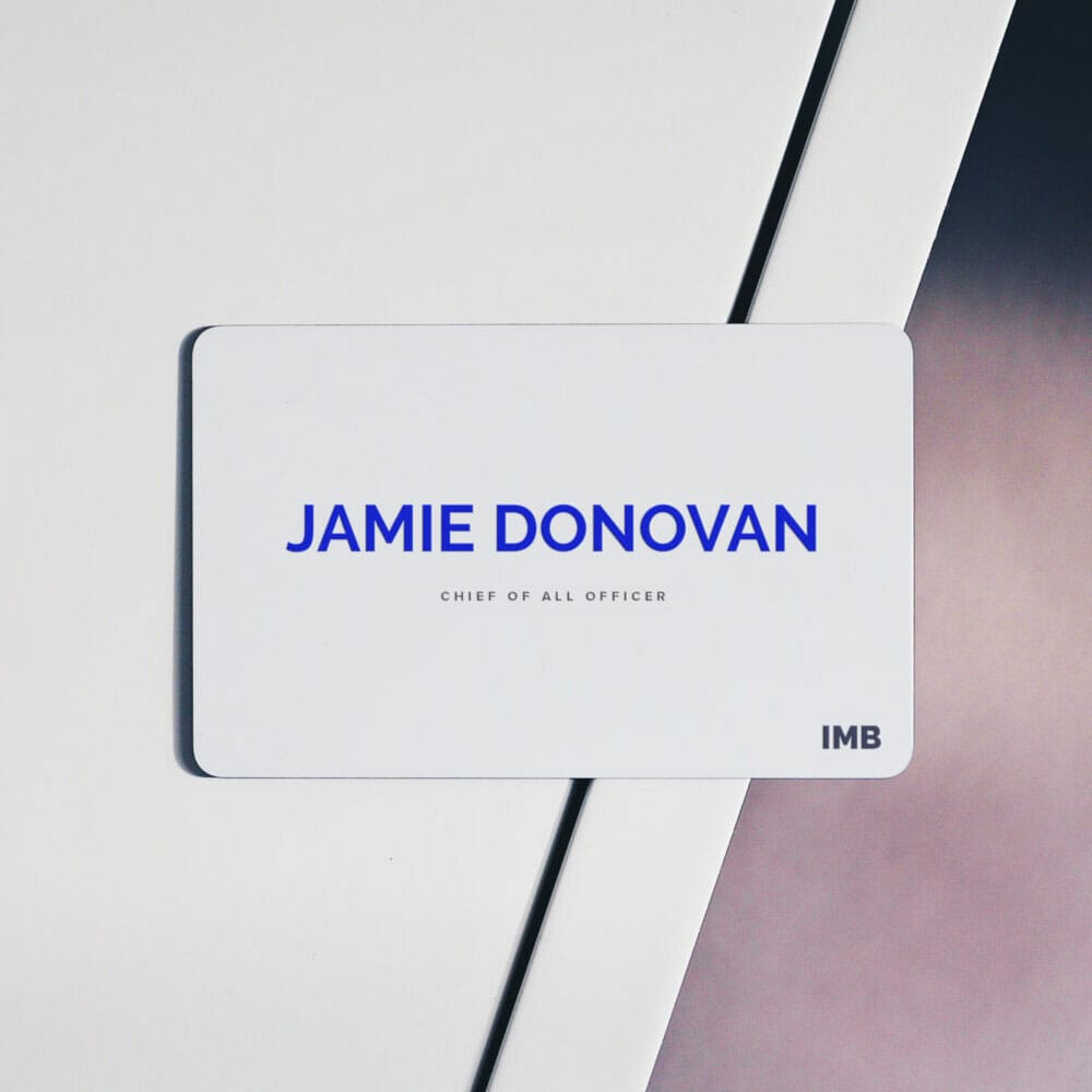 Free Hand holding Business Cards Mockups