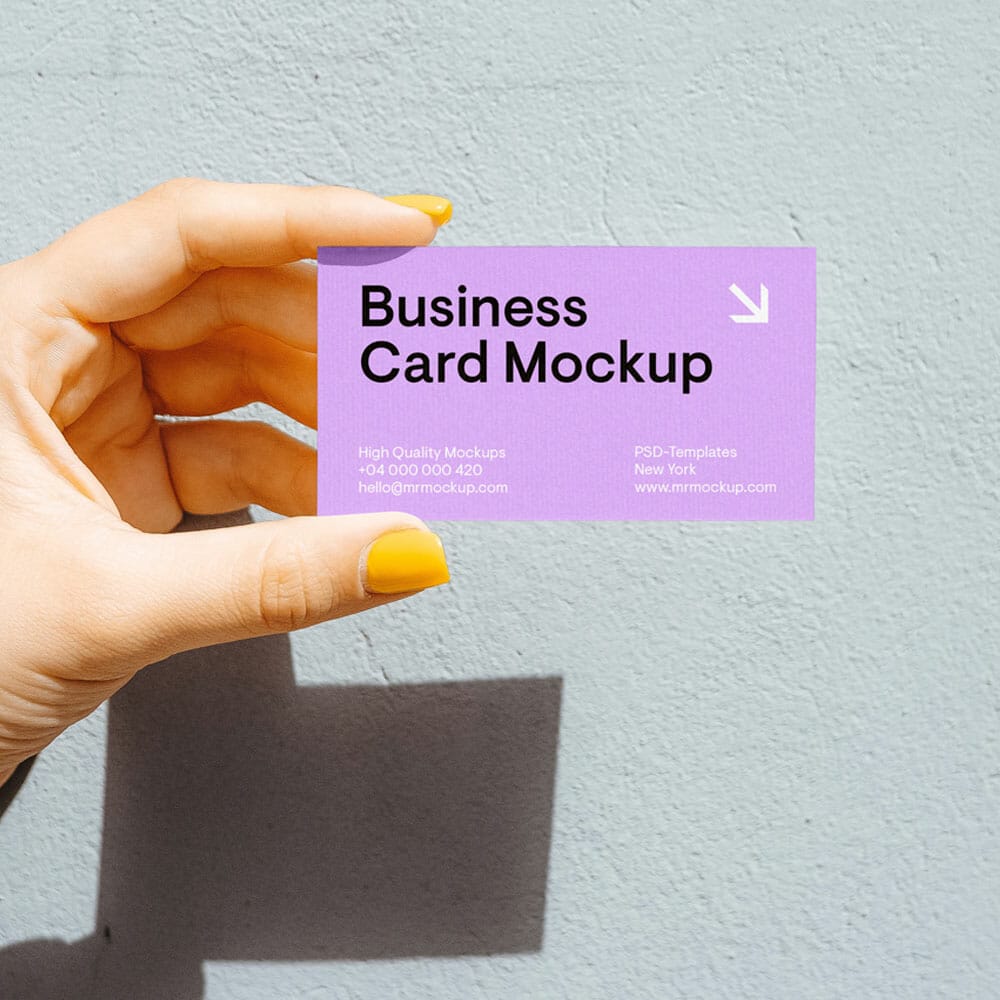 Business Card In Women Hand Mockup