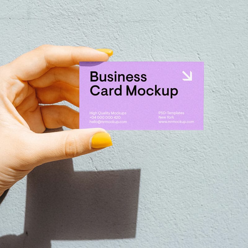 Business Card In Women Hand Mockup