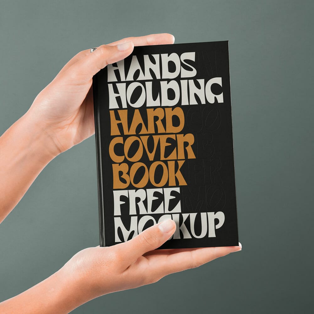 Free Hand Holding Hardcover PSD Book Mockup