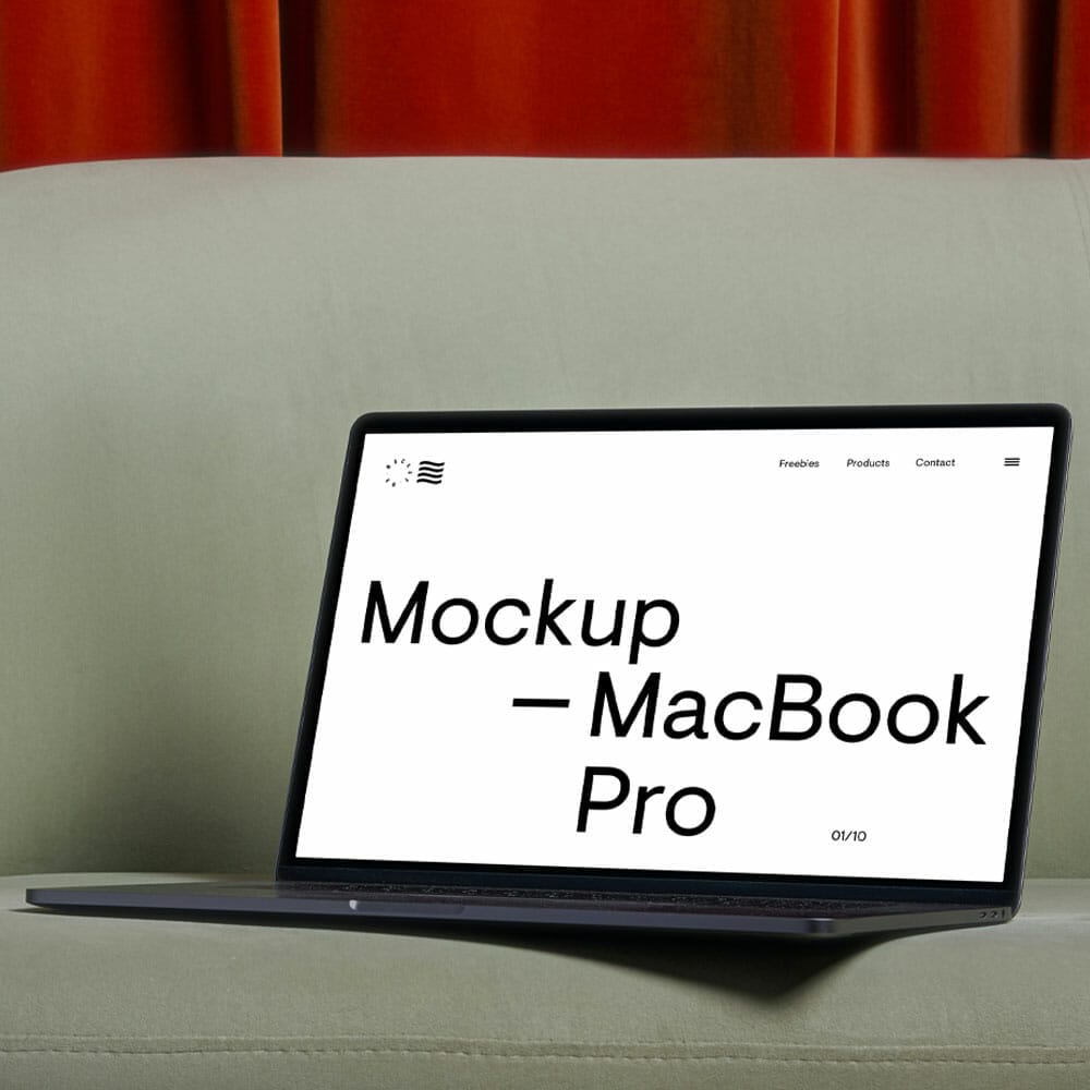 Free MacBook Pro Mockup On A Sofa