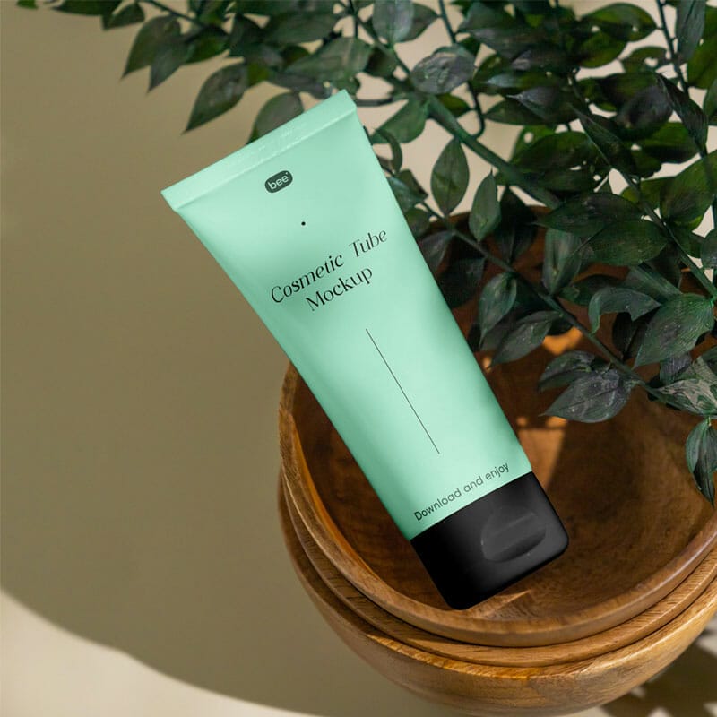 Free Cosmetic Tube With Plant Mockup PSD