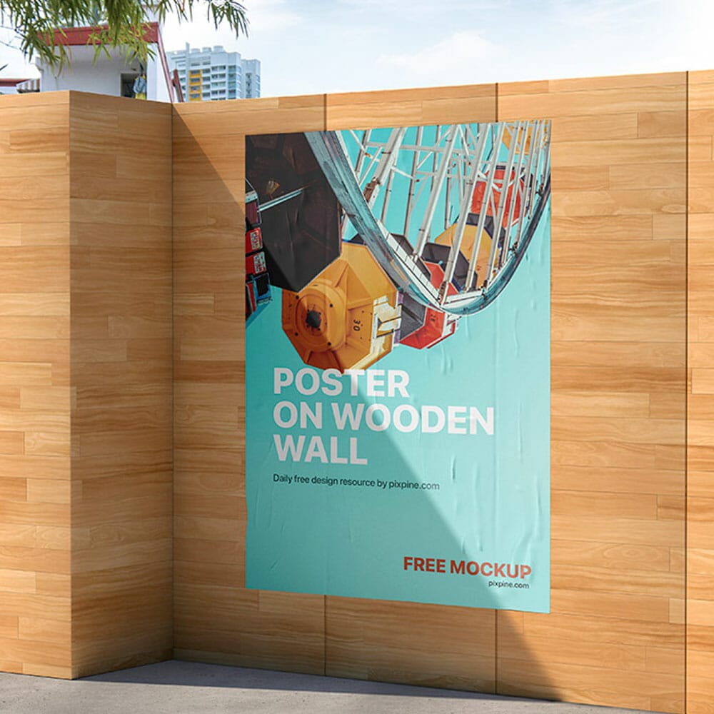 Free Poster On Wooden Wall Mockup PSD